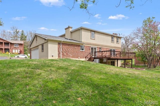 625 Pinebrook Dr, Town And Country, MO 63017 - back of property with a chimney, a deck, and a lawn