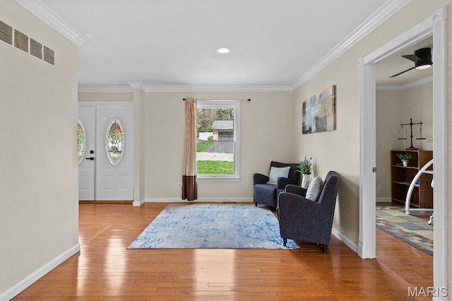 625 Pinebrook Dr, Town And Country, MO 63017 - sitting room featuring wood finished floors, baseboards, and crown molding