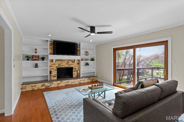 625 Pinebrook Dr, Town And Country, MO 63017 - living area with crown molding, baseboards, wood finished floors, a ceiling fan, and a fireplace