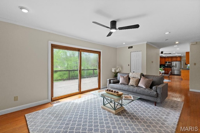 625 Pinebrook Dr, Town And Country, MO 63017 - living room featuring a ceiling fan, crown molding, wood finished floors, baseboards, and recessed lighting