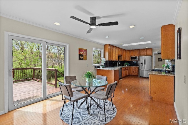 625 Pinebrook Dr, Town And Country, MO 63017 - dining space with ornamental molding, ceiling fan, light wood-type flooring, baseboards, and recessed lighting