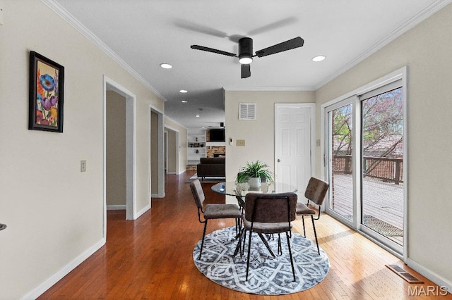 625 Pinebrook Dr, Town And Country, MO 63017 - dining room featuring wood finished floors, a ceiling fan, baseboards, crown molding, and recessed lighting