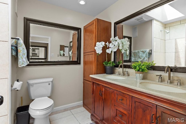 625 Pinebrook Dr, Town And Country, MO 63017 - full bathroom featuring toilet, tile patterned flooring, double vanity, a skylight, and a shower