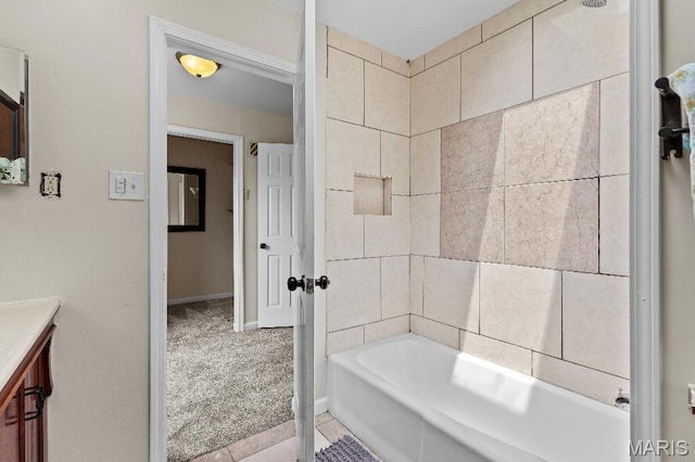 625 Pinebrook Dr, Town And Country, MO 63017 - bathroom with vanity, baseboards, and bathing tub / shower combination