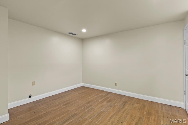 625 Pinebrook Dr, Town And Country, MO 63017 - spare room with baseboards, recessed lighting, and wood finished floors