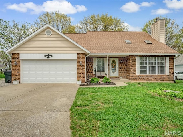 109 Miller Ct, Valmeyer, IL 62295 - view of front of property with brick siding, concrete driveway, a shingled roof, and a front yard