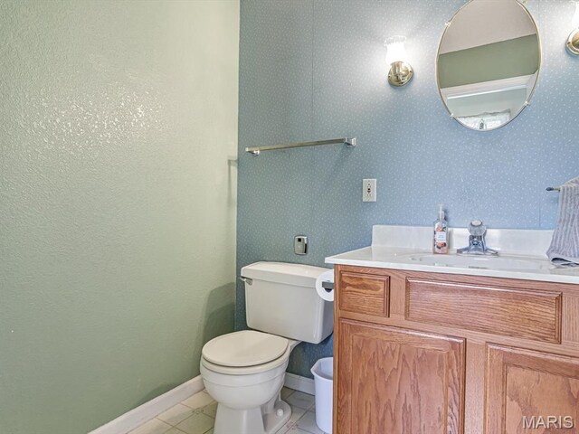 109 Miller Ct, Valmeyer, IL 62295 - half bath with toilet, vanity, tile patterned flooring, and baseboards