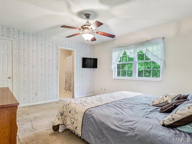 109 Miller Ct, Valmeyer, IL 62295 - carpeted bedroom featuring wallpapered walls, a ceiling fan, and a textured ceiling