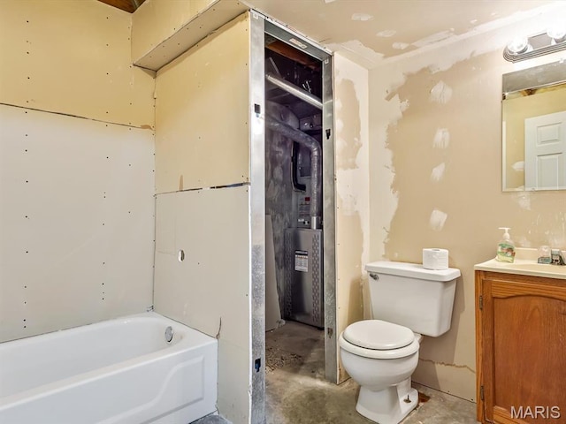 109 Miller Ct, Valmeyer, IL 62295 - full bathroom featuring vanity, a bathtub, toilet, and concrete floors