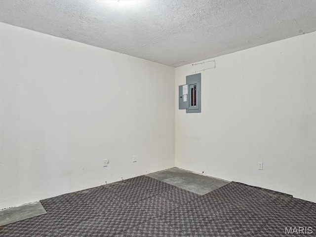109 Miller Ct, Valmeyer, IL 62295 - carpeted empty room with electric panel and a textured ceiling
