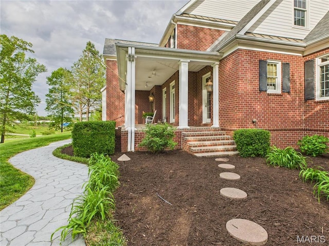 262 Woodland Hill Rd, Poplar Bluff, MO 63901 - entrance to property with brick siding and a porch