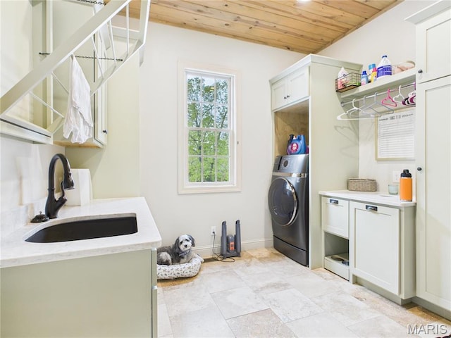262 Woodland Hill Rd, Poplar Bluff, MO 63901 - washroom with cabinet space, washer / dryer, wooden ceiling, and baseboards