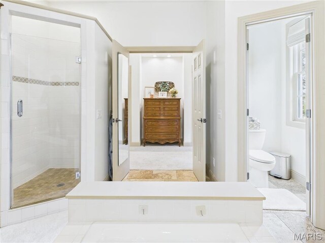 262 Woodland Hill Rd, Poplar Bluff, MO 63901 - bathroom featuring a stall shower and toilet