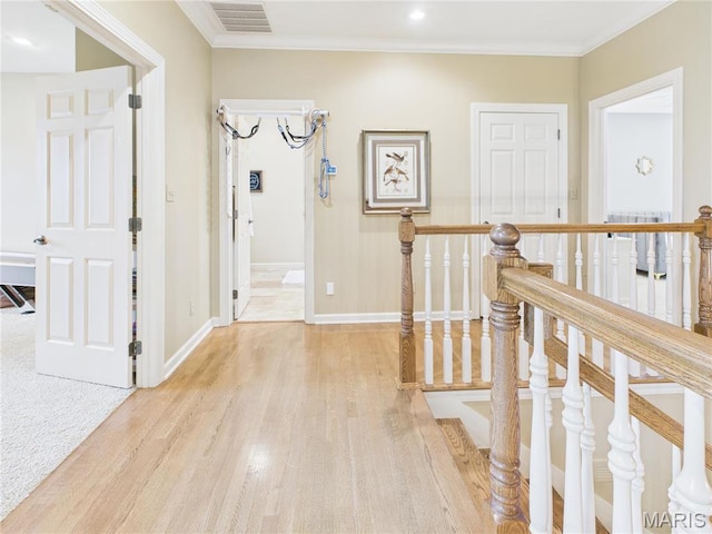 262 Woodland Hill Rd, Poplar Bluff, MO 63901 - corridor with wood finished floors, an upstairs landing, baseboards, ornamental molding, and recessed lighting