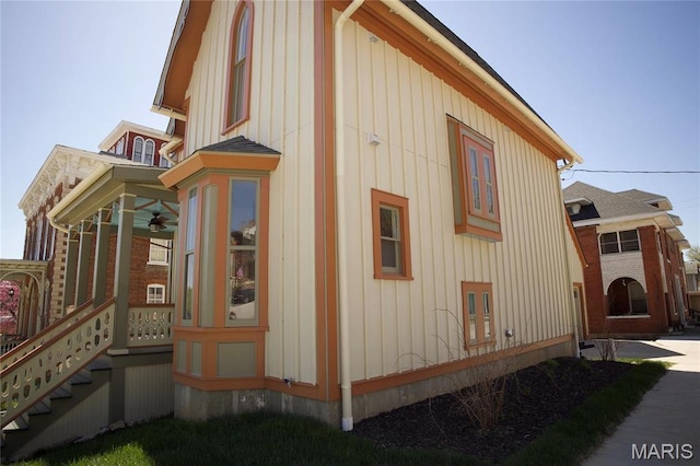 view of side of property featuring board and batten siding