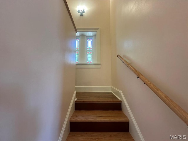 stairs featuring baseboards