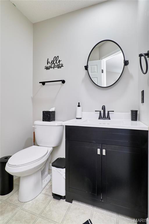 10 Warshire Ct Unit 67B, Ofallon, MO 63366 - bathroom featuring vanity and toilet