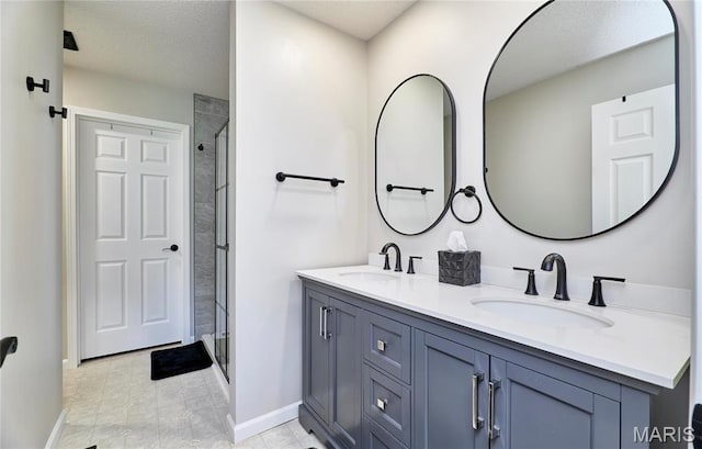 10 Warshire Ct Unit 67B, Ofallon, MO 63366 - full bath featuring baseboards, a stall shower, and double vanity