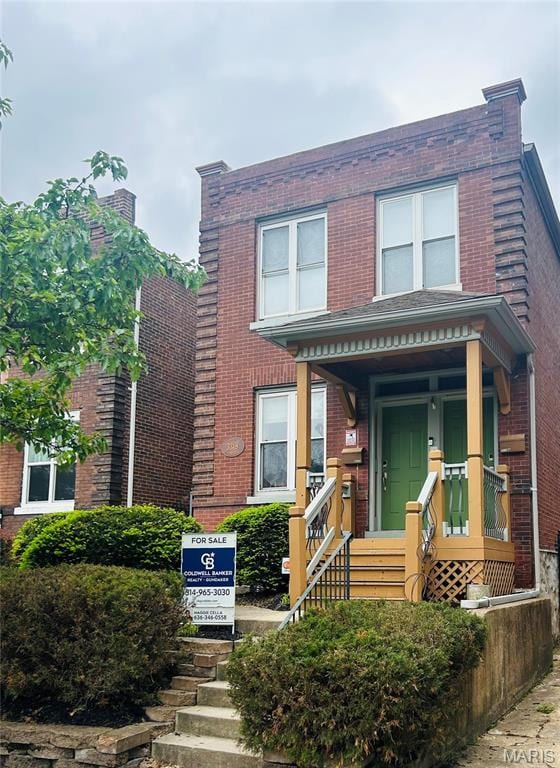 3318 Sidney St, Saint Louis, MO 63104 - view of front of house featuring brick siding