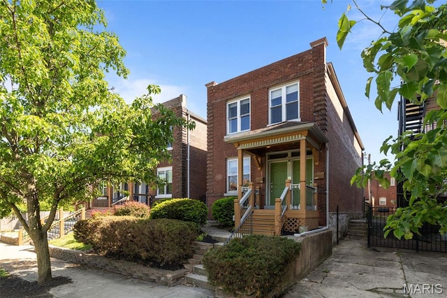 3318 Sidney St, Saint Louis, MO 63104 - view of front facade featuring brick siding