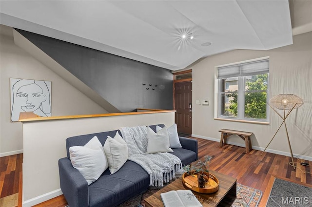 3318 Sidney St, Saint Louis, MO 63104 - living room with lofted ceiling, wood finished floors, and baseboards