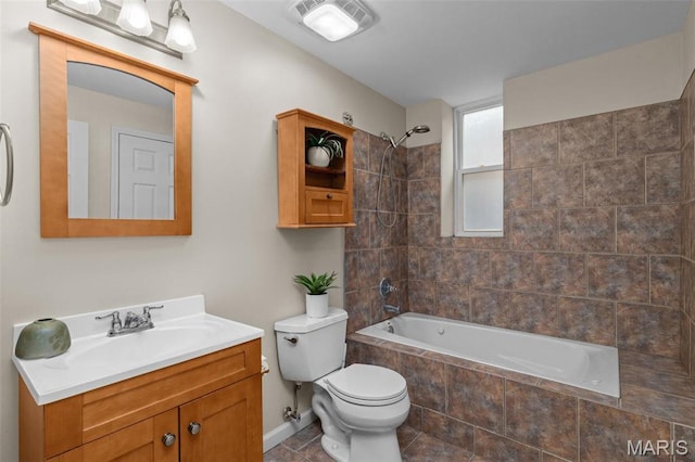 3318 Sidney St, Saint Louis, MO 63104 - bathroom with tiled shower / bath combo, vanity, toilet, and tile patterned floors