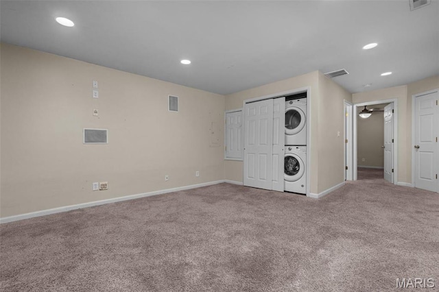 3318 Sidney St, Saint Louis, MO 63104 - laundry room featuring stacked washing machine and dryer, baseboards, carpet floors, ceiling fan, and recessed lighting