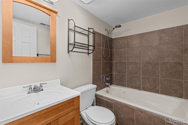 3318 Sidney St, Saint Louis, MO 63104 - bathroom with toilet, vanity, and tiled shower / bath combo