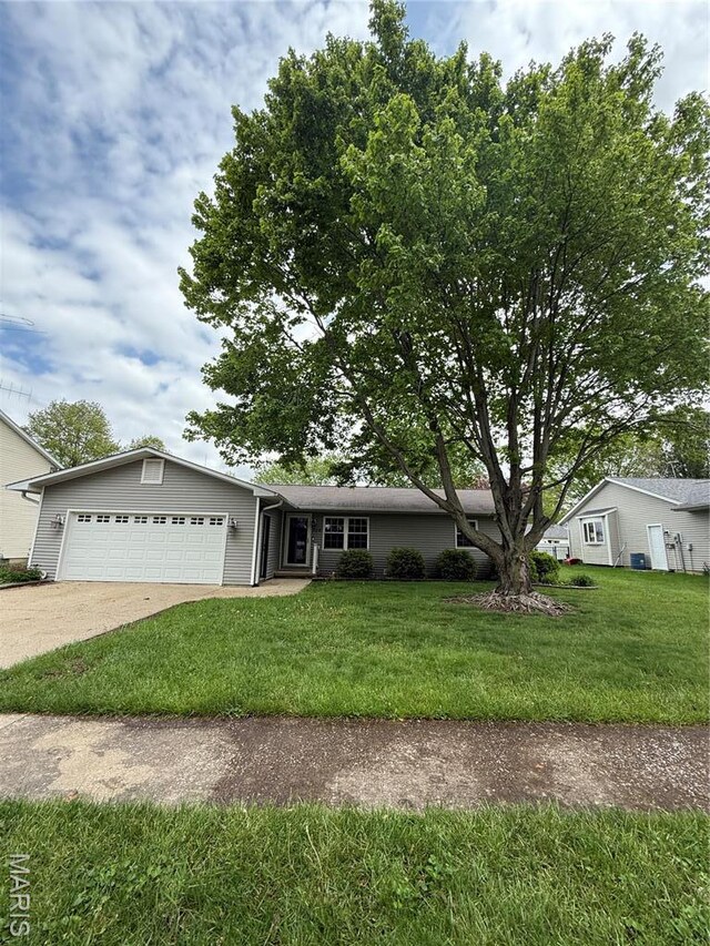710 Ash St, Greenville, IL 62246 - ranch-style home featuring a garage, a front yard, and driveway