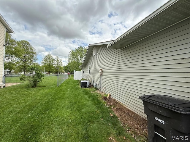 710 Ash St, Greenville, IL 62246 - view of side of home featuring central AC unit