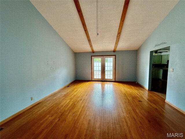 710 Ash St, Greenville, IL 62246 - spare room with wood finished floors, french doors, and ceiling fan