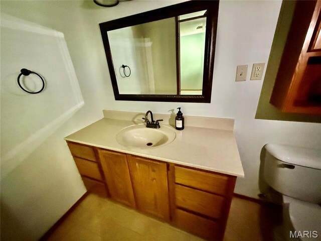 710 Ash St, Greenville, IL 62246 - bathroom featuring vanity and toilet