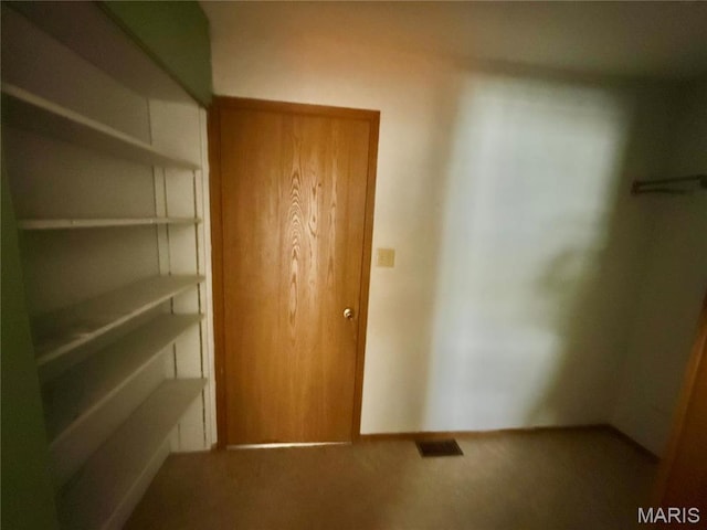 710 Ash St, Greenville, IL 62246 - unfurnished bedroom featuring carpet floors