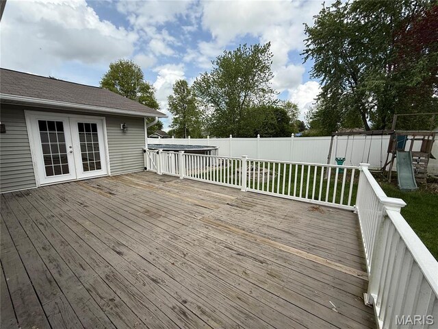 710 Ash St, Greenville, IL 62246 - deck with french doors and a playground