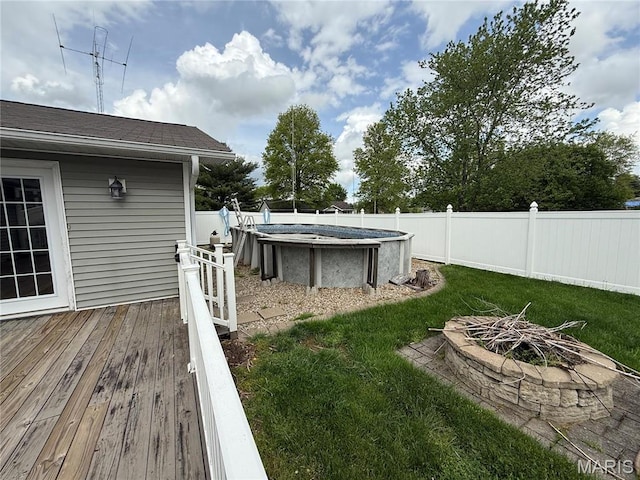 710 Ash St, Greenville, IL 62246 - view of yard with an outdoor fire pit and a wooden deck