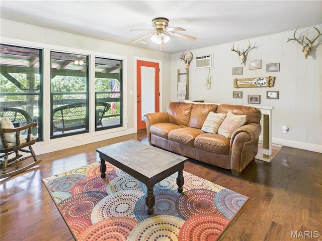 1 Richbark Ln, Van Buren, MO 63965 - living room featuring ceiling fan, hardwood / wood-style floors, baseboards, and a wall mounted AC