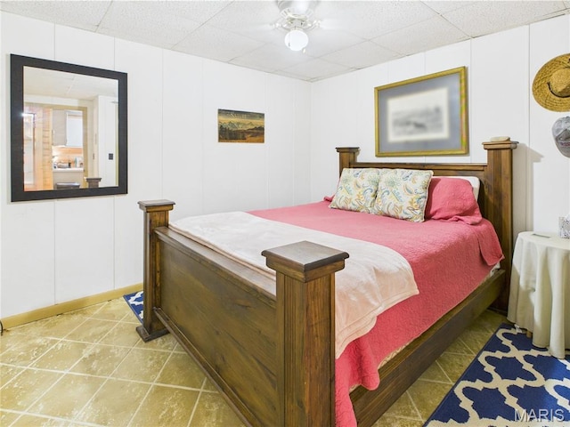 1 Richbark Ln, Van Buren, MO 63965 - bedroom with a paneled ceiling, a decorative wall, and baseboards