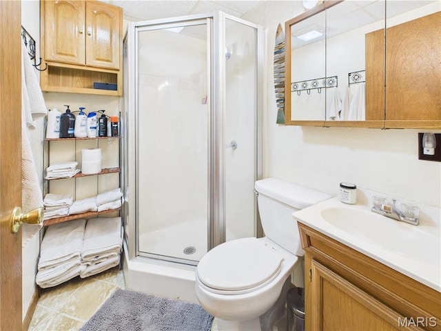 1 Richbark Ln, Van Buren, MO 63965 - bathroom with vanity, a stall shower, toilet, and tile patterned floors