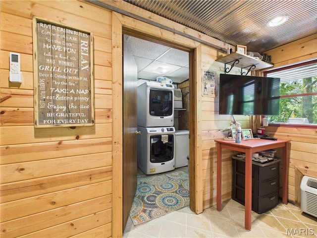 1 Richbark Ln, Van Buren, MO 63965 - kitchen featuring stacked washer / dryer, wood walls, and tile patterned flooring