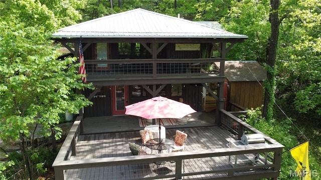 1 Richbark Ln, Van Buren, MO 63965 - rear view of property with a deck, outdoor dining space, and metal roof