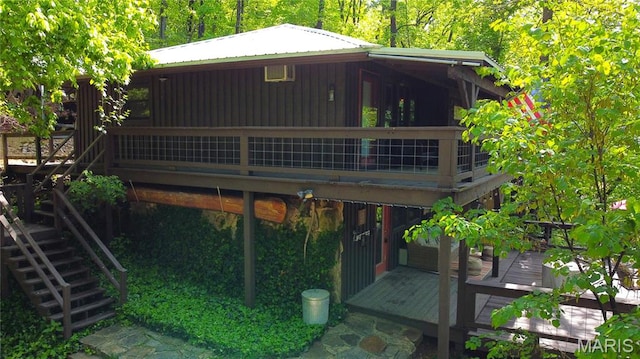 1 Richbark Ln, Van Buren, MO 63965 - view of front facade featuring stairway, a wooden deck, and metal roof