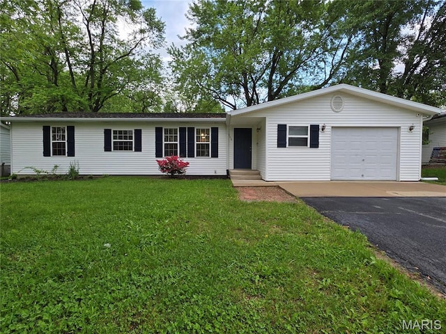 306 Edna Ln, Sparta, IL 62286 - single story home with driveway, a front lawn, a garage, and entry steps