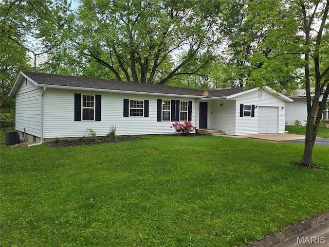 306 Edna Ln, Sparta, IL 62286 - ranch-style house with a garage, driveway, central AC unit, and a front lawn