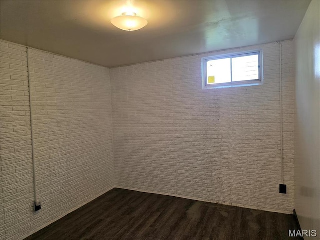 306 Edna Ln, Sparta, IL 62286 - empty room with dark wood-style flooring