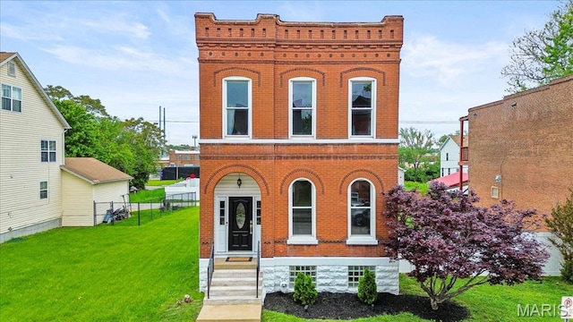 view of front facade featuring brick siding