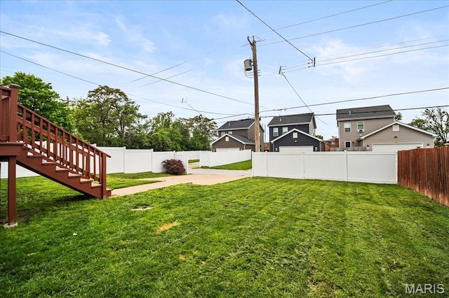 view of yard featuring stairs