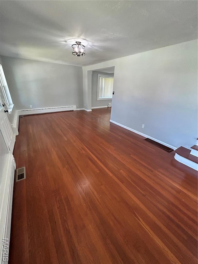 3604 Ridgedale Ave, Saint Louis, MO 63121 - unfurnished room featuring dark wood-type flooring and baseboards