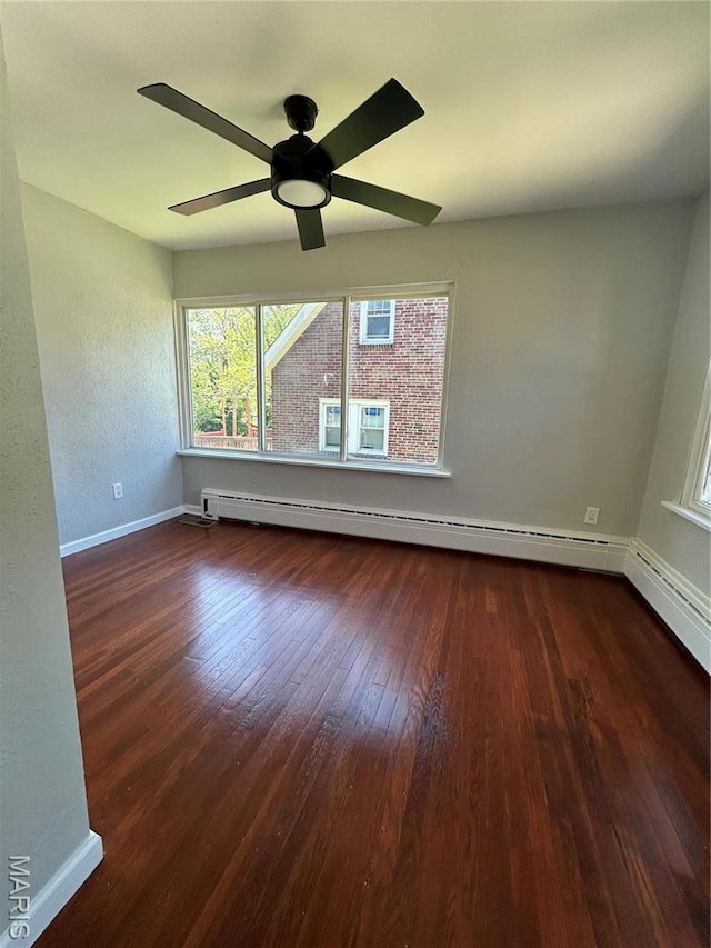3604 Ridgedale Ave, Saint Louis, MO 63121 - empty room with wood finished floors, plenty of natural light, baseboards, and ceiling fan