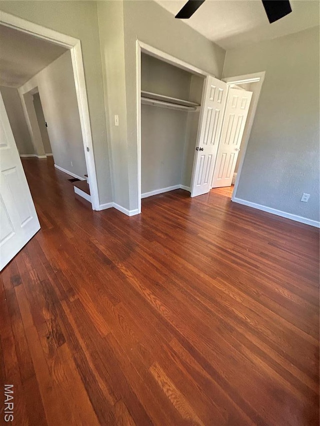 3604 Ridgedale Ave, Saint Louis, MO 63121 - unfurnished bedroom with wood finished floors, baseboards, and a closet
