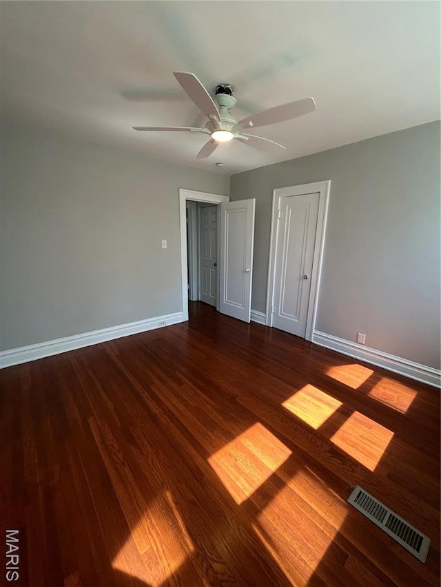 3604 Ridgedale Ave, Saint Louis, MO 63121 - unfurnished bedroom featuring wood finished floors, baseboards, and ceiling fan